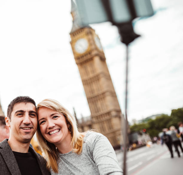 istock happiness friend in london take a selfie 1166364824
