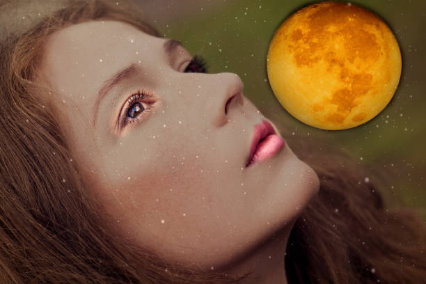 Portrait young beauty woman lying on bed with moon shine behind. https://moon.nasa.gov/internal_resources/352/