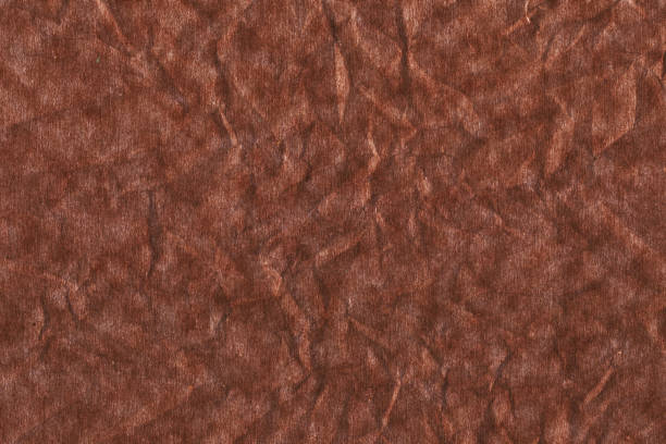 istock dark brown paper cardboard carton background surface wallpaper 1166370664