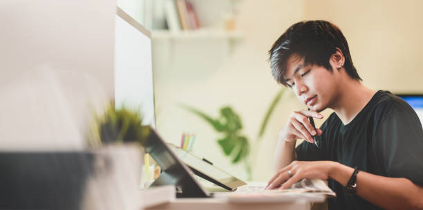 istock Motivated photographer working on his project 1166371387