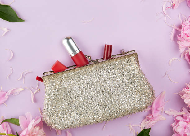 istock open silver clutch and cosmetics fell out of the middle 1166372332