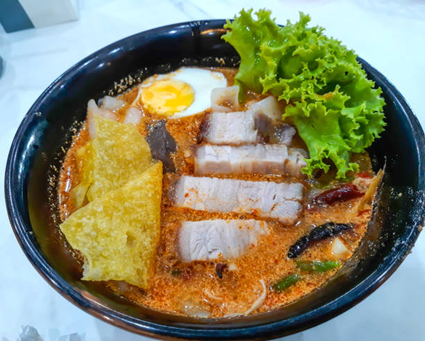 istock Spicy noodle with 
crispy pork ,Thai food. 1166372942