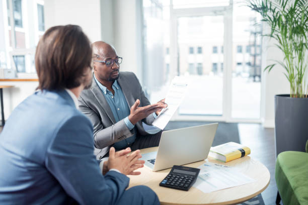 istock Employee showing documents to boss during the meeting 1166375288
