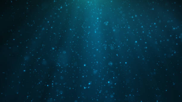 istock Abstract particles background of shining, sparkling blue particles. Beautiful blue floating dust particles with shine light. 3D Rendering 1166376568