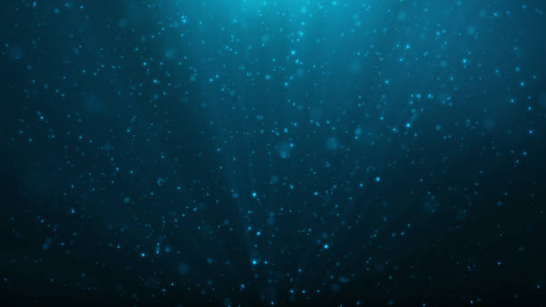istock Abstract particles background of shining, sparkling blue particles. Beautiful blue floating dust particles with shine light. 3D Rendering 1166376573