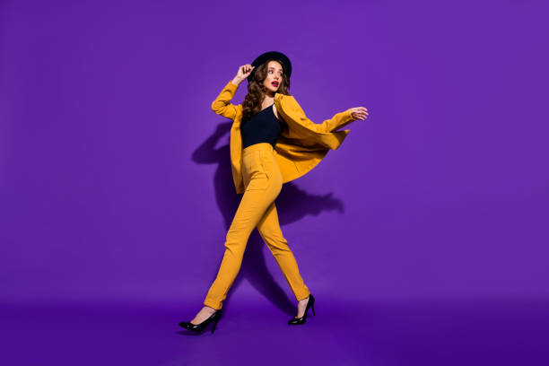 istock Profile side full length body size view of nice-looking chic glamorous gorgeous attractive lovely wavy-haired lady motion enjoying strolling isolated over bright vivid shine violet lilac background 1166376894