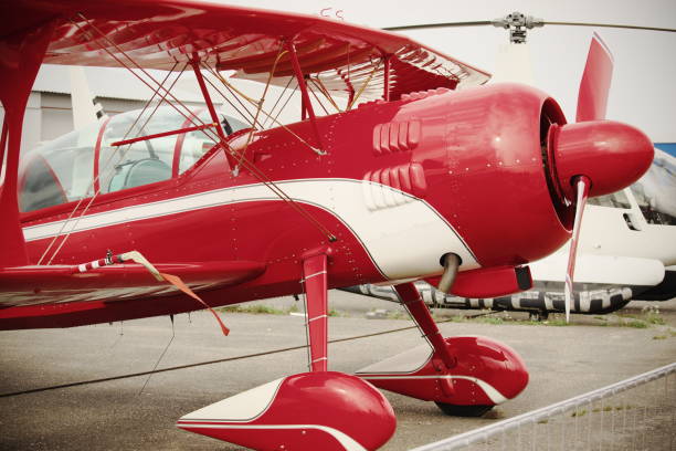 istock Red-white retro airplane with propeller 1166378414