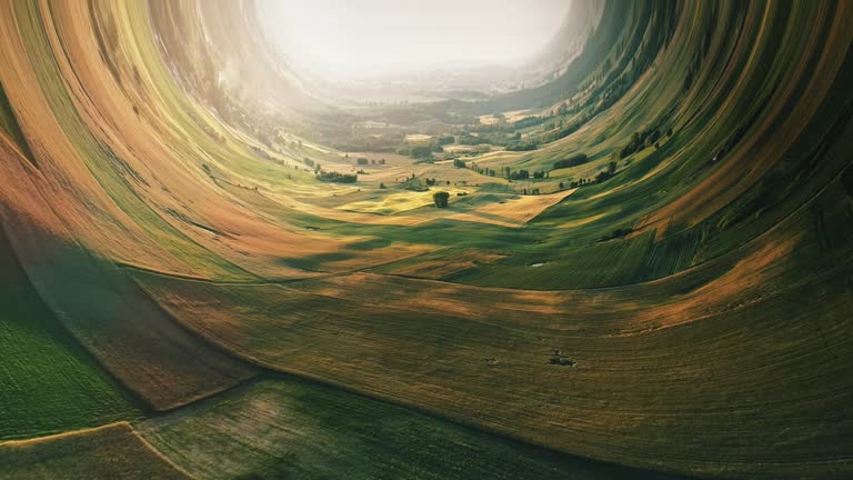 Borderless worlds. Bending rural landscape with fields