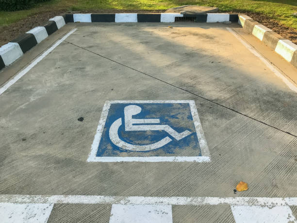 istock disable people parking sign at parking lot 1166381410