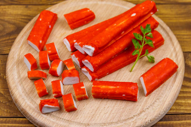 istock Crab sticks on cutting board on wooden table 1166389546