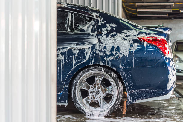 Cleaning the car (Car detailing) at car care shop stock photo