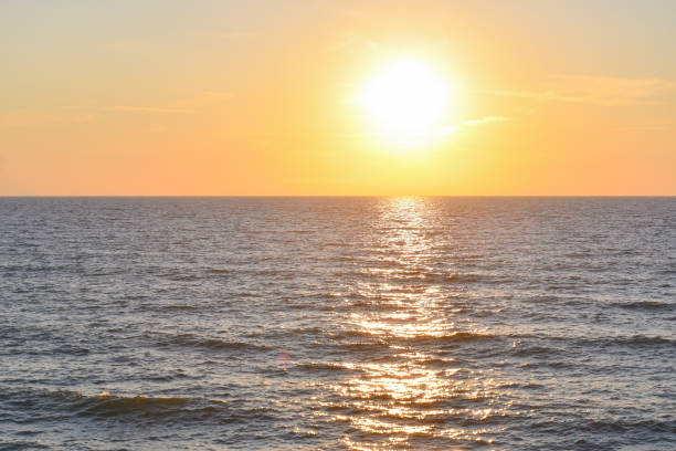 istock Sunset on the sea 1166392597