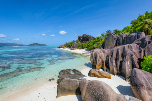 istock Beautiful tropical beach Anse Source d´Argent with sculpted granite rocks and palm trees - La Digue . Island of La Digue, Seychelles, Indian Ocean Islands. 1166394017