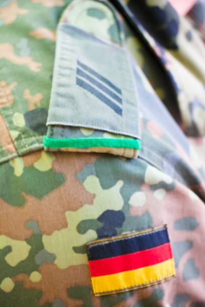 istock German flag and lance corporal badge on military jacket 1166394385
