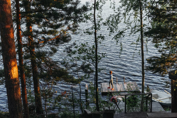 istock A young boy is fishing 1166395601