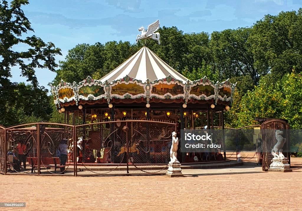 France.Lyon.The grand carousel of the Parc de la tête d'or. France. Lyon. Large carousel of the Parc de la Tête d'or. Famous carousel of wooden horses of the nineteenth century. Lyon Stock Photo
