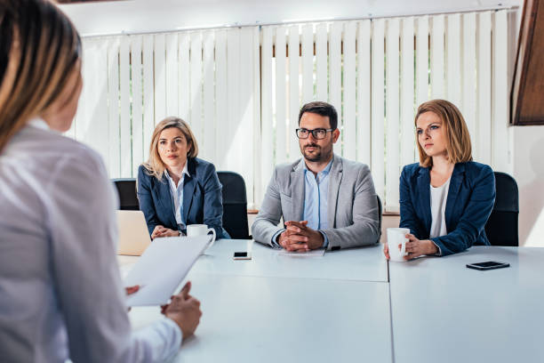 istock Human resources - job interview concept. Hr team considering can 1166399294