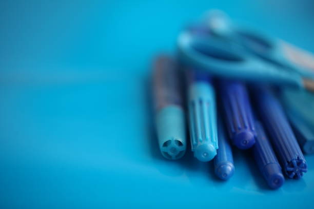 istock Concert education globe books microscope and pencils on background. 1166399972