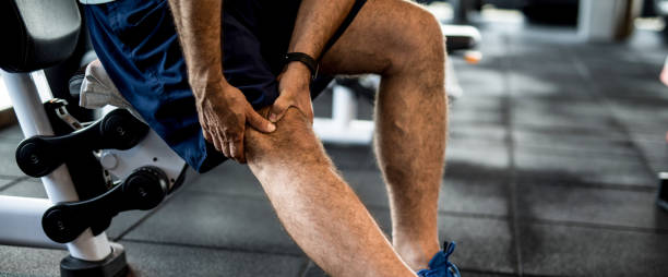 istock Mature man having feeling strong knee pain while in the gym. 1166400395