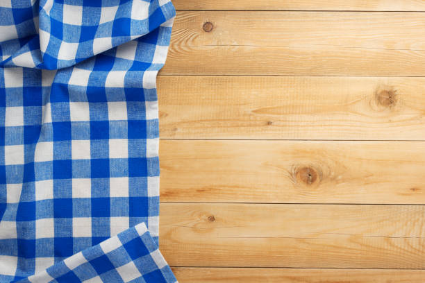 istock cloth napkin at rustic table wooden plank board 1166404709