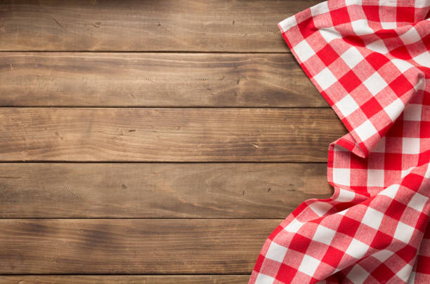 istock cloth napkin at rustic table wooden plank board 1166404804