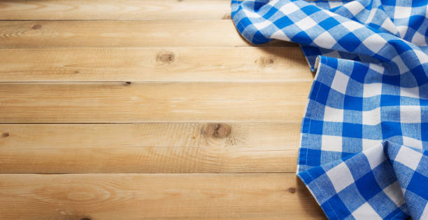 istock cloth napkin at rustic table wooden plank board 1166404979