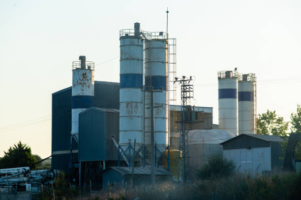 A Concrete Chemical Plant Factory and Raw Materials Tanks