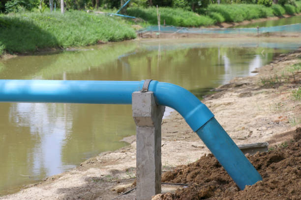 istock Blue water pipe with support concrete. Water pipeline for agriculture. 1166408390