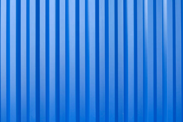 Blue metal sheet wall background. Vertical metal sheet background.
