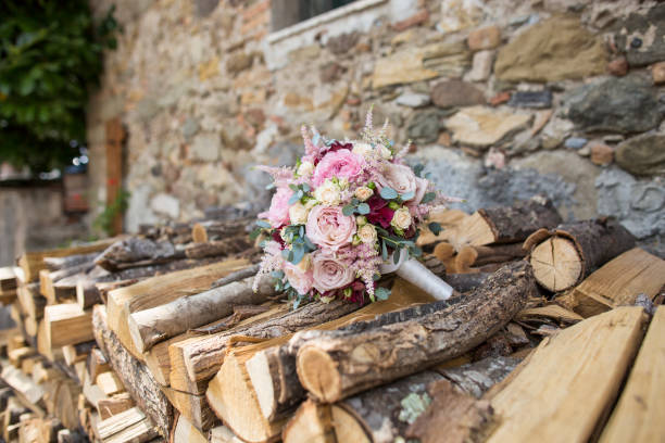 istock colorful bridal bouquet placed on a woodpile 1166408567