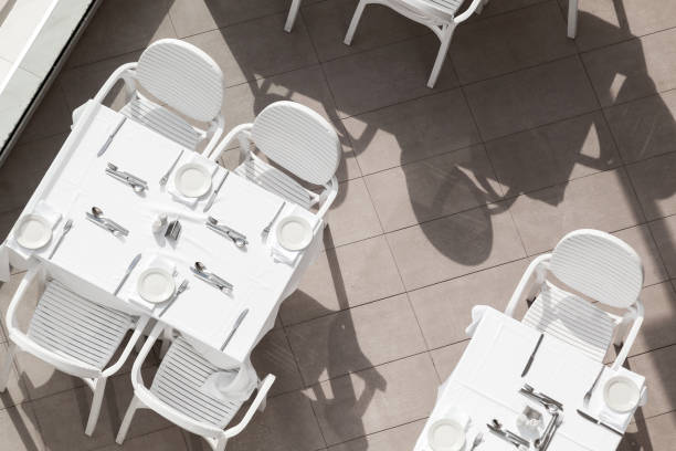 istock White tables and chairs, outdoor terrace 1166409112