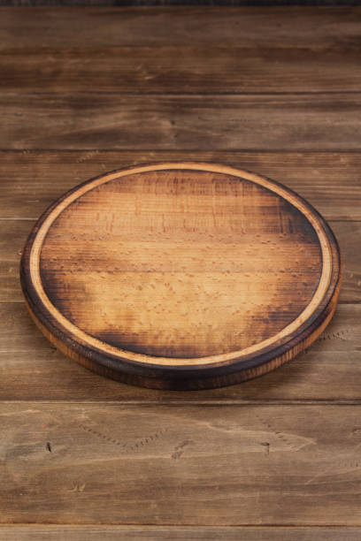 istock pizza cutting board at rustic wooden table plank 1166409269