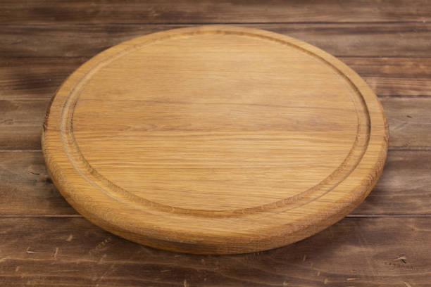 istock pizza cutting board at rustic wooden table plank 1166409271