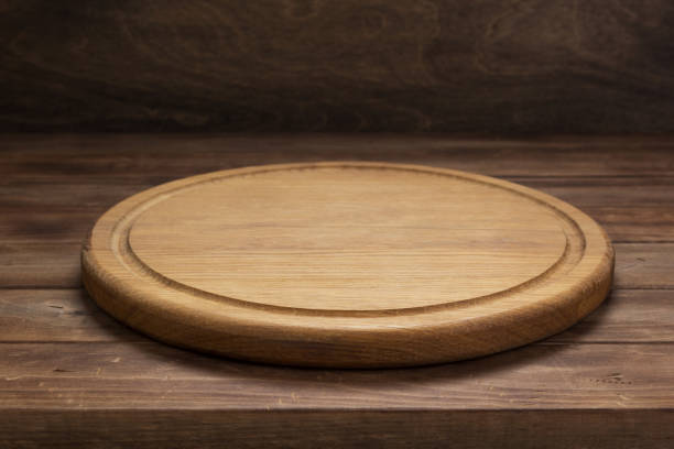 istock pizza cutting board at rustic wooden table plank 1166409371
