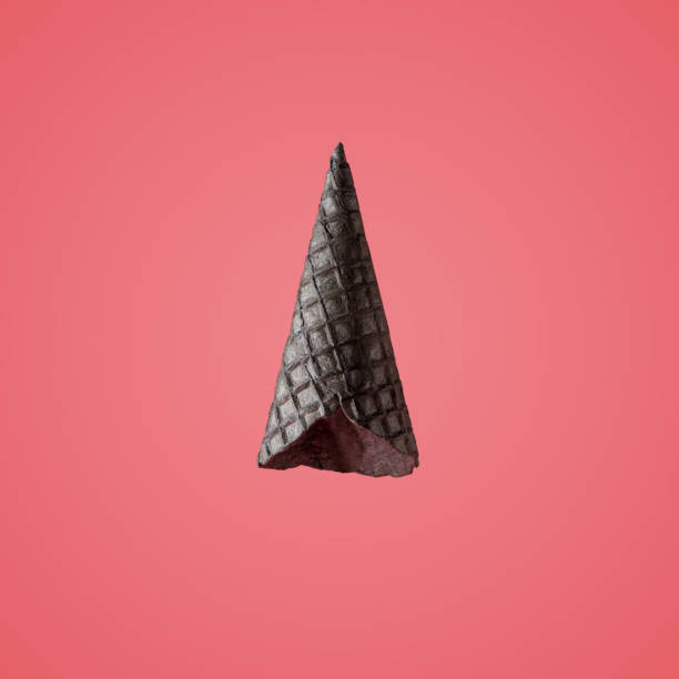 istock Upside down black ice cream cone on bright background. Minimal summer concept. 1166410463