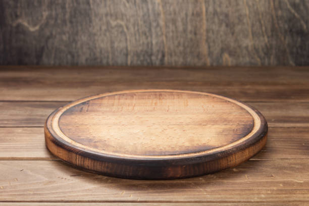 istock pizza cutting board at rustic wooden table plank 1166411362