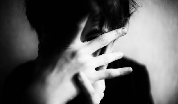istock Teen boy covers his face with his hands 1166413028