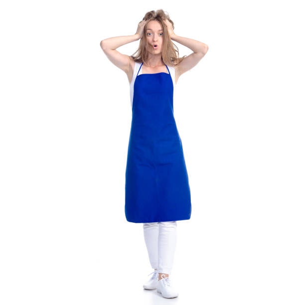 istock Woman in blue apron smile 1166413408