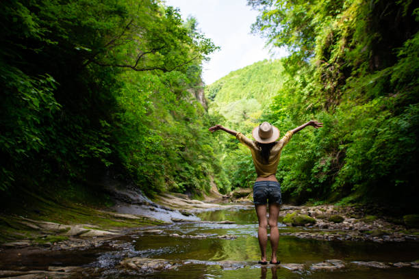 istock Japanese woman relaxing in the river 1166413583