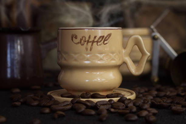 a cup of hot coffee on wood table