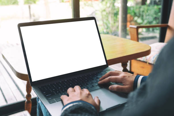 istock a woman using and typing on laptop keyboard with blank white desktop screen 1166417528