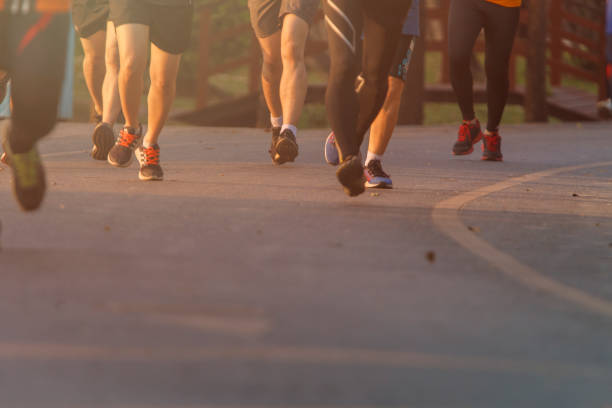 istock Marathon running race, Run up the mountain road. 1166417657