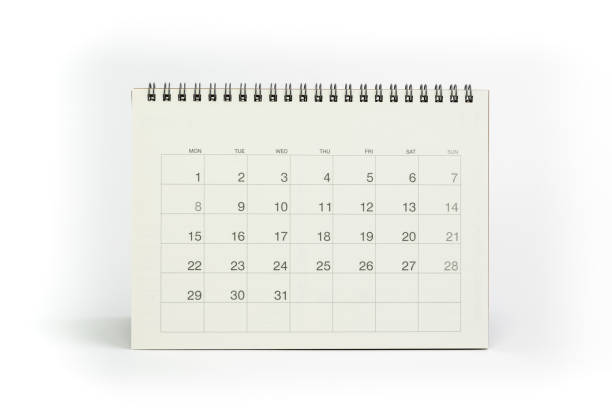 White clean desktop calendar isolated on white background with copy space for month and year using as reminder, planning, schedule or appointment concept stock photo