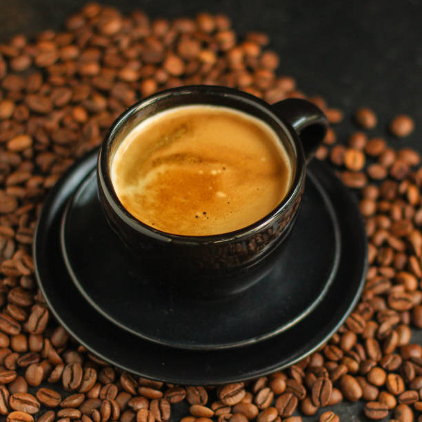 istock coffee freshly brewed in a white cup serving of beverage (coffee grain). food. top. copy space 1166421144