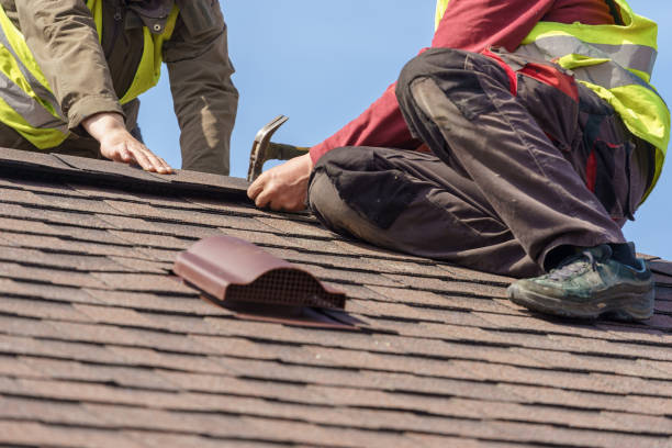 istock Workman install element of tile roof on new home under construction 1166422499