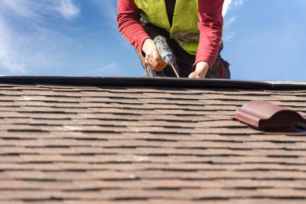 istock Workman install element of tile roof on new home under construction 1166422613