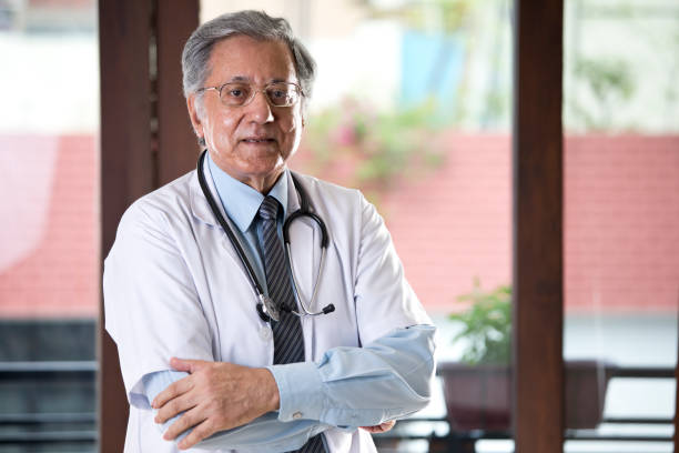 istock Senior Indian doctor looking at camera 1166424583