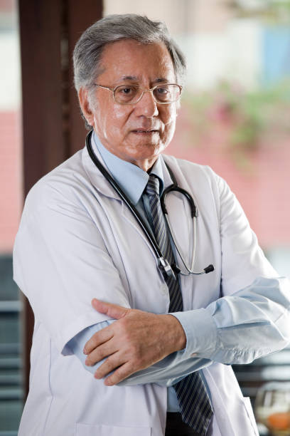 istock Senior Indian doctor looking at camera 1166424608