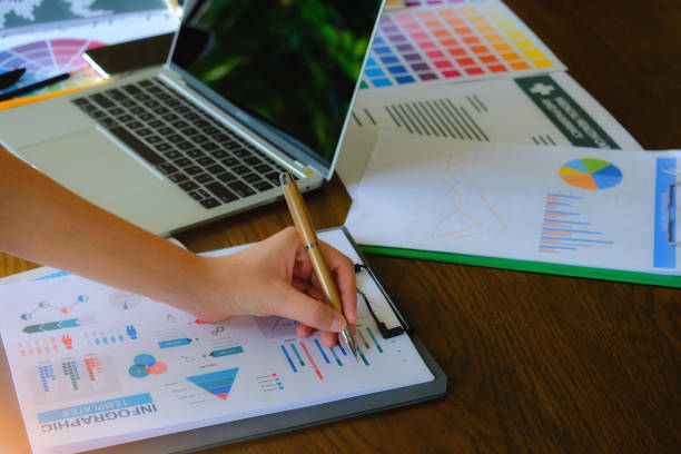 istock Finances and calculate on desk. 1166427323