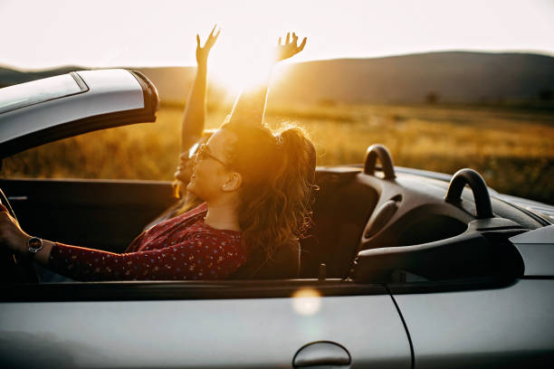 istock Young women traveling by car 1166431950